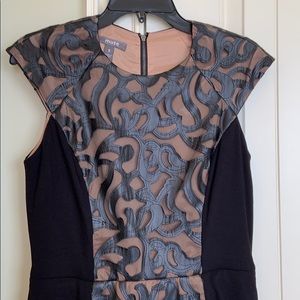 Black partially leather dress!  Classy and sassy!